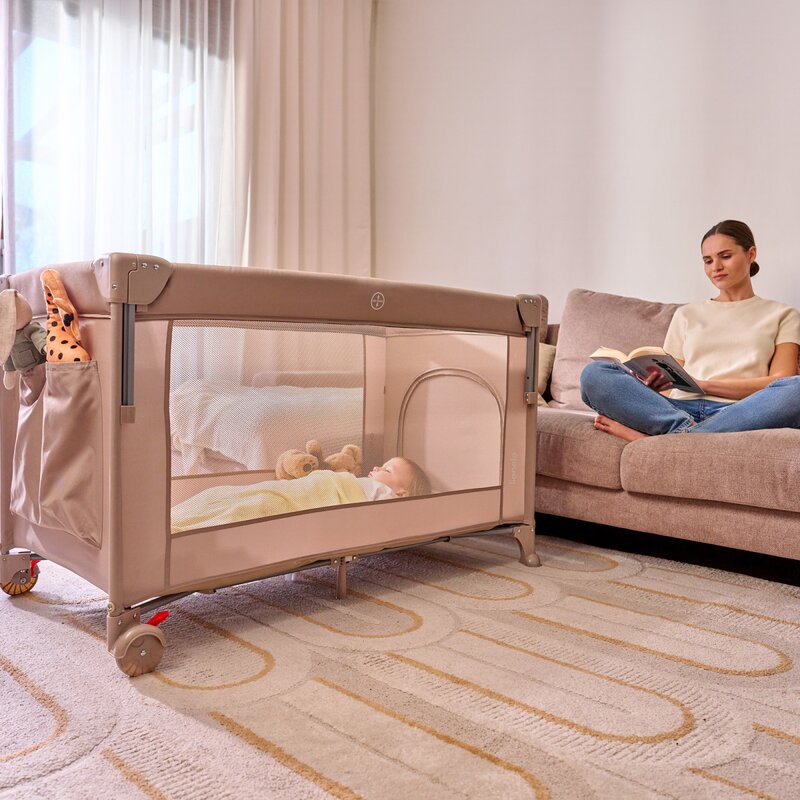 Patut pliant multifunctional, Lionelo, Ellen, Cu laterala culisanta, Nivel suplimentar, Intrare laterala cu fermoar, 2 roti, Saltea pliabila si geanta de transport incluse, 0- 36 luni, Pana la 15 kg, 120x60 cm, Conform cu EN 716, Negru